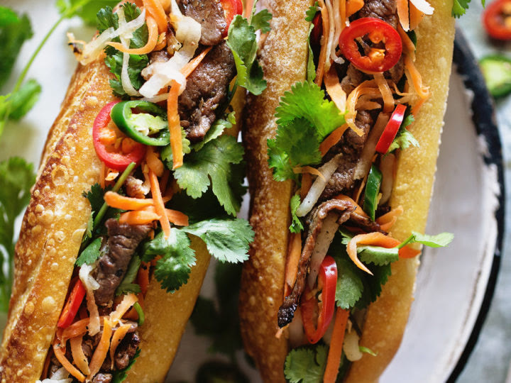 Close-up of Vietnamese subs with BBQ beef, pickled carrot and coriander